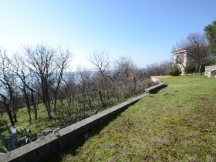 Large property with several houses first row to the sea 22