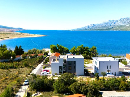 House with four apartments and two swimming pools, 50 meters from the sea, in the second row of houses.