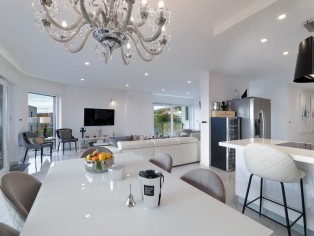 Luxuriöse Smart-Penthouse mit großzügiger Ausstattung und atemberaubenden Sonnenuntergang 7